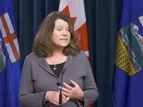 Lori Sigurdson, Minister of Jobs, Skills, Training and Labour, during a news conference on amendments to Bill 6 at the Alberta legislature in Edmonton on Dec. 7, 2015.