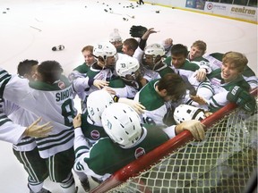 Delta Hockey Academy Wild celebrates defeating the Burnaby Winter Club Bruins in the World Sport School Challenge at the Edge School in Springbank on Sunday.