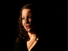 Katelyn Lucas, executive director of The Elizabeth Fry Society of Calgary poses for a portrait in her office on November 10, 2015.