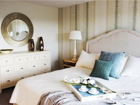 The master bedroom in the Varscona show home by Genesis Builder Group in EvansRidge.