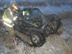 Two men were sent to hospital after a Jeep Cherokee (pictured) and a Chevrolet Equinox crashed head-on at Highway 567 and Range Road 285 on Friday, December 11, 2015.