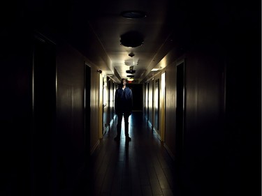 Tong Leich stands in a hallway leading to various client bedrooms at the Fresh Start Recovery Centre in Calgary on Tuesday, October 27, 2015.