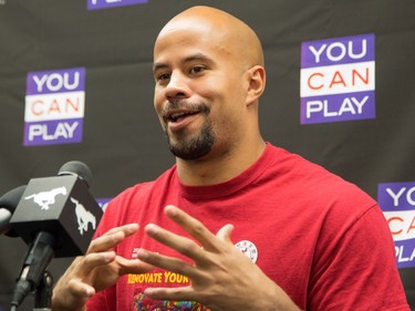 Calgary Stampeder Jon Cornish, and CFL Commissioner Mark Cohon, not pictured, talk about their involvement in "You Can Play" at a press conference in Calgary, on June 27, 2014. You Can Play is a program that is dedicated to promoting respect for all athletes, regardless of sexual orientation.