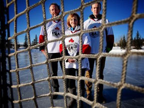 Kelly and Dianne Kimmett and their son Reid stand on the ice at Mitford Pond in Cochrane, where the Kimmett Cup, an annual hockey charity event for their daughter Lindsay Kimmett, a U of C medical student who died near the family acreage in a crash in 2008, will be played this weekend.