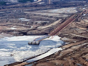 An oil sands facility seen from a helicopter near Fort McMurray.