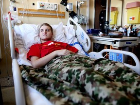 Alex, 15, in his hospital room where he has been since a tobogganing accident on Dec. 21 left him a paraplegic.
