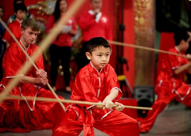 A member of the Calgary Tai Chi and Martial Arts College performs during the opening ceremonies of the 2016 Year of the Monkey Chinese New Year Carnival at the Chinese Cultural Centre.