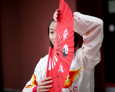 Cheryl Wan, 15, practices her tai chi fan before performing with the Calgary Tai Chi and Martial Arts College during the opening ceremonies of the 2016 Year of the Monkey Chinese New Year Carnival at the Chinese Cultural Centre in Calgary, Ab., on Saturday January 30, 2016.
Photo by Leah Hennel/Postmedia
For City by ?