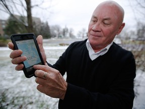 Ken Dale, CEO of Touchplow, an Uber-like app that connects snow plow contractors with people that need snow clearing, shows off his software.
