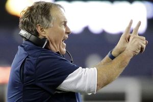 New England Patriots head coach Bill Belichick coaches from the sideline in the first half of an NFL divisional playoff football game against the Kansas City Chiefs, Saturday, Jan. 16, 2016, in Foxborough, Mass. (AP Photo/Elise Amendola)