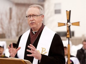 EDMONTON,ALBERTA ; MARCH 8, 2014--Most Rev. Richard Smith, Archbishop of Edmonton speaks prior to the ground breaking for the Catholic Parish of Corpus Christi on 34th Street near 28A Avenue on March 8, 2014. The growing Catholic community in southeast Edmonton is another step closer to having a new home for worship and gathering. Corpus Christi will be the first Catholic church built in the Edmonton area since Holy Trinity was completed in Spruce Grove in 2002. It will seat 1,500 people. The new parish has grown out of St. Theresas Parish in Millwoods, which at more than 5,000 families is the largest in the Archdiocese of Edmonton.Greg Southam/Edmonton Journal