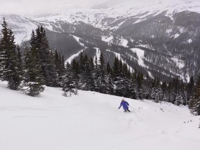 A skier at Sunshine Village after the Goat's Eye chairlift reopened Sunday.