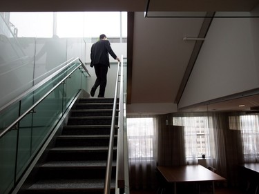 A man walks up the stairs to the former Premier Alison Redford's sky palace that's now been repurposed as meeting rooms in Edmonton, Alta., on Tuesday, January 26, 2016. The space came to symbolize the excesses of the Progressive Conservative government.