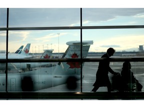 Passengers commute at the Calgary International Airport onTuesday January 26, 2016. Calgary International Airport (YYC) once again reached a new passenger milestone in 2015, welcoming a record 15.48 million passengers. This figure represents an increase of 1.4 per cent over 2014, which was also a record year for YYC. Photo by Leah Hennel/Postmeida For Business story by ?