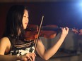 Sixteen-year-old violinist Angela Ryu performs at the Calgary Herald.