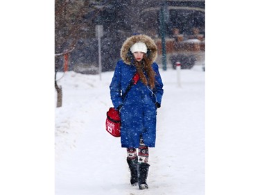 Calgarians commuters faced a snowy cold morning on Thursday January 7, 2015.