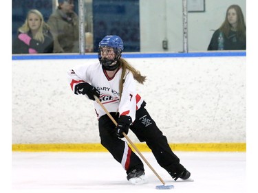 Taryn Glimpel moves the ring down the ice. The Calgary NW Crew earned a gold medal with an overtime 4-to-3 win over the Saskatoon Ice in the U19A division of the Esso Golden Ring tournament on  Sunday, January 17, 2016.