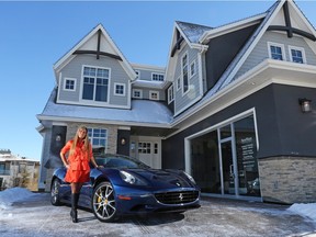 Realtor Grace Yan, with Sotheby's International Realty Canada, at a multi-million dollar home in Watermark at Bearspaw where the owner is offering to include a Ferrari California to the buyer.