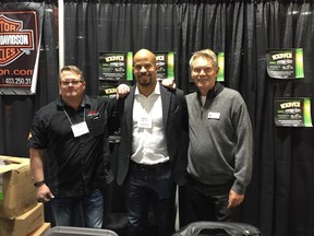 Cal 0116 Raffle alone Retired Calgary Stampeder great Jon Cornish (centre) provided the celeb quotient at this past weekend's Calgary Motorcycle Show held in the BMO Centre. Cornish was on hand to help sell raffle tickets for the Bill Brooks Prostate Cancer raffle. First prize is a new Camero. Second prize, a new Harley Davidson. And third prize, two tickets anywhere WestJet flies. Tix are $50 each or 3 for $100 and are available through billbrooksraffle.ca. Pictured at right is Brooks and left is Calgary Harley Davidson's Rob Dzikewich.