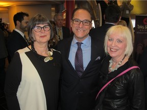 Cal 0116 Yellow 2 Among the dignitaries in attendance at the  official launch of One Yellow Rabbit's 30th Anniversary High Performance Rodeo held Jan 7 atop the Calgary Tower  were Alberta Minister of Finance Joe Ceci with One Yellow Rabbit (OYR) managing director and artistic producer, High Performance Rodeo Ann Connors (left) and OYR consultant Dale Turri.