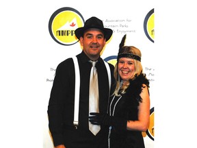 Cal 0123 Rockies 2 Looking  the part at the recent Roaring Twenties themed fundraiser held at the Fairmont Banff Springs in support of  the Association for Mountain Parks Protection &  Enjoyment  (AMPPE) are  Banff-Airdrie MP Blake Richards and Calgary Nose Hill MP Michelle Rempel.