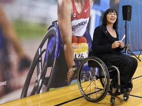 Chantal Petitclerc, Canada's Chef De Mission for the Rio 2016 Paralympics, speaks at a wheel chair basketball demonstration at Mount Royal University on Tuesday. Petitclerc and other Paralympic athletes were on hand to promote Paralympic sport on the road to Rio.