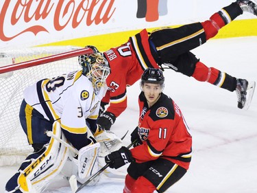 The Calgary Flames' Sam Bennett flies behind the net during game action against the Nashville predators in Calgary on Wednesday January 27, 2016. Nashville won the game 2-1.