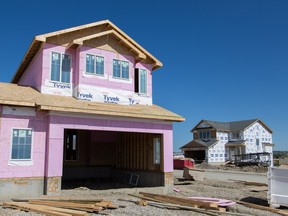 Jack Mintz says higher housing costs in Calgary will partly lead to more urban sprawl as development crosses municipal boundaries, including into Okotoks, where this home has been built.