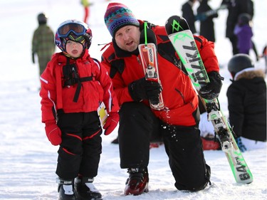 Rod O'Brien and his son Maximus, 3, came out to enjoy the cold weather at WinSport on Sunday. The cold weather didn't stop people from coming out to Canada World Winter Snow day where kids under 12 were free when accompanied by a paying adult on Sunday, January 17, 2016.