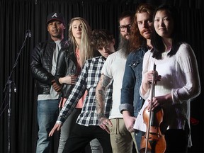 Calgary musicians gather onstage at the Ironwood Stage and Grill. Pictured from the left are Jamimba Hutson who goes by A.Y.E., Sykamore, Taylor Cochrane, Danny Vacon, JJ Shiplett and Angela Ryu.