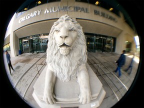 A lion statue stands outside of City Hall in downtown Calgary on Monday, Jan. 25.