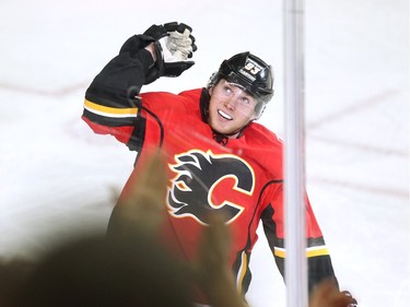 Calgary Flames centre Sam Bennett signalled that the monkey was off his back after he scored the Flames third goal of the game against the San Jose Sharks during second period NHL action at the Scotiabank Saddledome on January 11, 2016.