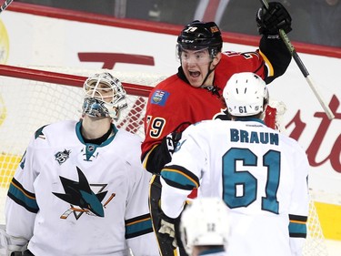 Calgary Flames left winger Micheal Ferland celebrated scoring the Flames fourth goal of the game against San Jose Sharks goalie Marting Jones during third period NHL action at the Scotiabank Saddledome on January 11, 2016. The Sharks defeated the Flames 5-4.