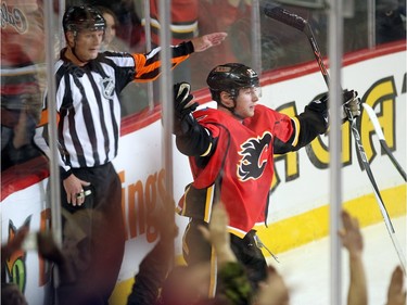 Calgary Flames centre Sam Bennett celebrated after scoring the Flames third goal of the game against the San Jose Sharks during second period NHL action at the Scotiabank Saddledome on January 11, 2016.