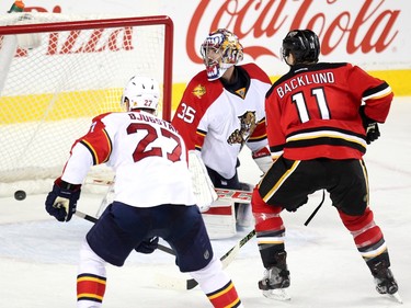 Florida Panthers goalie Al Montoya looked over his shoulder as a shot by centre Sam Bennett slipped into the net for his fourth of the night during the final seconds of the third period NHL action at the Scotiabank Saddledome on January 13, 2016. The Flames shutout the Panthers 6-0 thanks in part to the 4 goals by Bennett.