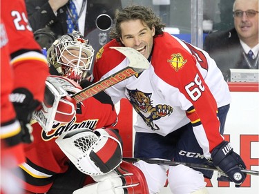Florida Panthers right winger Jaromir Jagr chatted with Calgary Flames goalie Karri Ramo as the teams skated during warmup prior to the NHL game against the Calgary Flames on January 13, 2016.