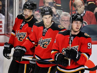 Calgary Flames Deryk Engelland, Sean Monahan and Sam Bennett during a game against Nashville Predators in NHL hockey in Calgary, Alta., on Wednesday, January 27, 2016.