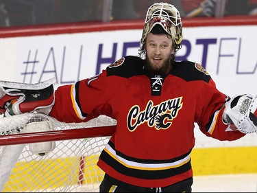Calgary Flames Karri Ramo reacts after giving up a goal to the Nashville Predators during NHL hockey in Calgary, Alta., on Wednesday, January 27, 2016.