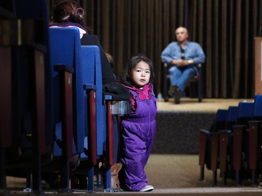 Six year-old Gracie Catface came with her family to hear a speech by Dwight Dorey, National Chief with the Congress of Aboriginal Peoples, speaks at the Central Library in Calgary on Sunday January 10, 2015. The family of 5 recently moved from their Piikani Nation reserve to find work and a new home in Calgary.