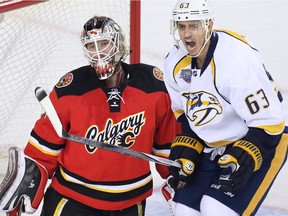 The Nashville Predators' Mike Ribeiro shouts after watching Shea Weber's shot go past Calgary Flames goaltender Karri Ramo during the second period of Nashville's 2-1 win over the Flames at the Saddledome on Wednesday.