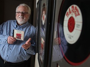 Greg Thomas displays his collection of music from his early 1960s-era band The Esquires at his Calgary home.