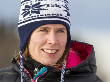 Olympic silver medalist cross-country skier Sara Renner stands at Mount View School in Calgary, Alta., on Tuesday, Jan. 26, 2016. The Calgary Fire Department and Calgary Police Service, along with a pair of Olympians, went head-to-head in a relay race for an announcement by AltaGas to support Cross Country Ski de Fond Canada's Ski at School program for the next three years. Lyle Aspinall/Postmedia Network