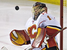 Calgary Flames goalie Jonas Hiller makes a save against the Edmonton Oilers on Saturday in Edmonton. He will make his third-straight start on Tuesday in New Jersey.