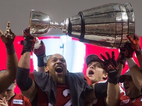 Juwan Simpson won two Grey Cup titles in an eight-year tenure with the Calgary Stampeders, including in 2014, when he fessed up to breaking the top off the Cup. The Stamps cut the veteran loose on Monday in a surprising move, citing the salary cap.