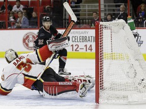 Carolina Hurricanes forward Kris Versteeg scores against Calgary Flames goalie Karri Ramo during the second period on Sunday.