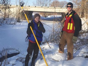 A Matrix Solutions ecologist and environmental scientist conduct field work for a water quality monitoring project.