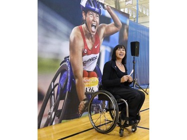 Chantal Petitclerc, Canada's Chef De Mission for the Rio 2016 Paralympics, speaks at a wheel chair basketball demonstration at Mount Royal University on Tuesday. Petitclerc and other Paralympic athletes were on hand to promote Paralympic sport on the road to Rio.