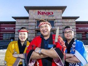 Owner Peter Kinjo is flanked by VP and co-owner Yukiko Kaizuka, left, and area manager Mark Wang outside  Kinjo District Sushi and Grill at Country HIlls Boulevard and 14th Street N.E. It's the fourth Kinjo restaurant to open in Calgary, with a fifth slated for next year in Mahogany.