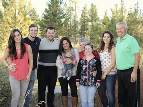 Josie Price, Marcus Astley, Scott Price, Alejandra Price holding baby Rafael Price, Ginny Price, Allie Price, Torey Price and Al Price during a trip to Wilderness Club.