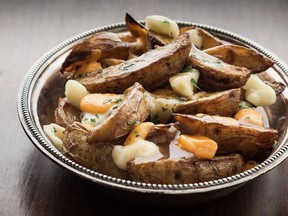 Poutine with stout gravy will satisfy the Super Bowl fans at your party.